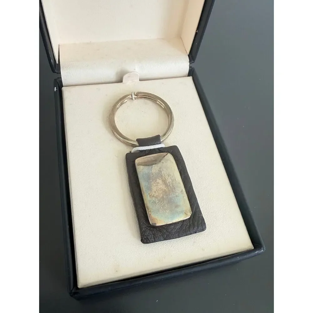 Vintage Monet for Men leather & metal keychain in its original branded box